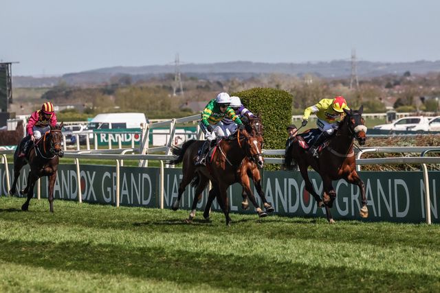 Honesty Policy ridden by Mark Walsh pushes in front of Regent's Stroll ridden by Harry Cobden during the Randox Grand National 2025 Day 3 Grand National Day at Aintree Racecourse, Liverpool, United Kingdom, 5th April 2025

(Photo by Mark Cosgrove/News Images)