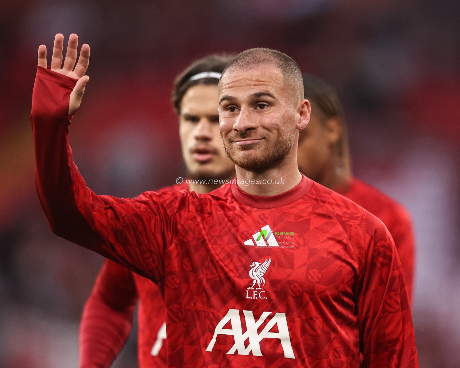 Alexis Mac Allister of Liverpool waves to the fans in the pregame warmup session during the UEFA Champions League Matchday 1 of 8 match Liverpool vs Atletico Madrid at Anfield, Liverpool, United Kingdom on 09 September 2026

(Photo by Alfie Cosgrove/News Images)