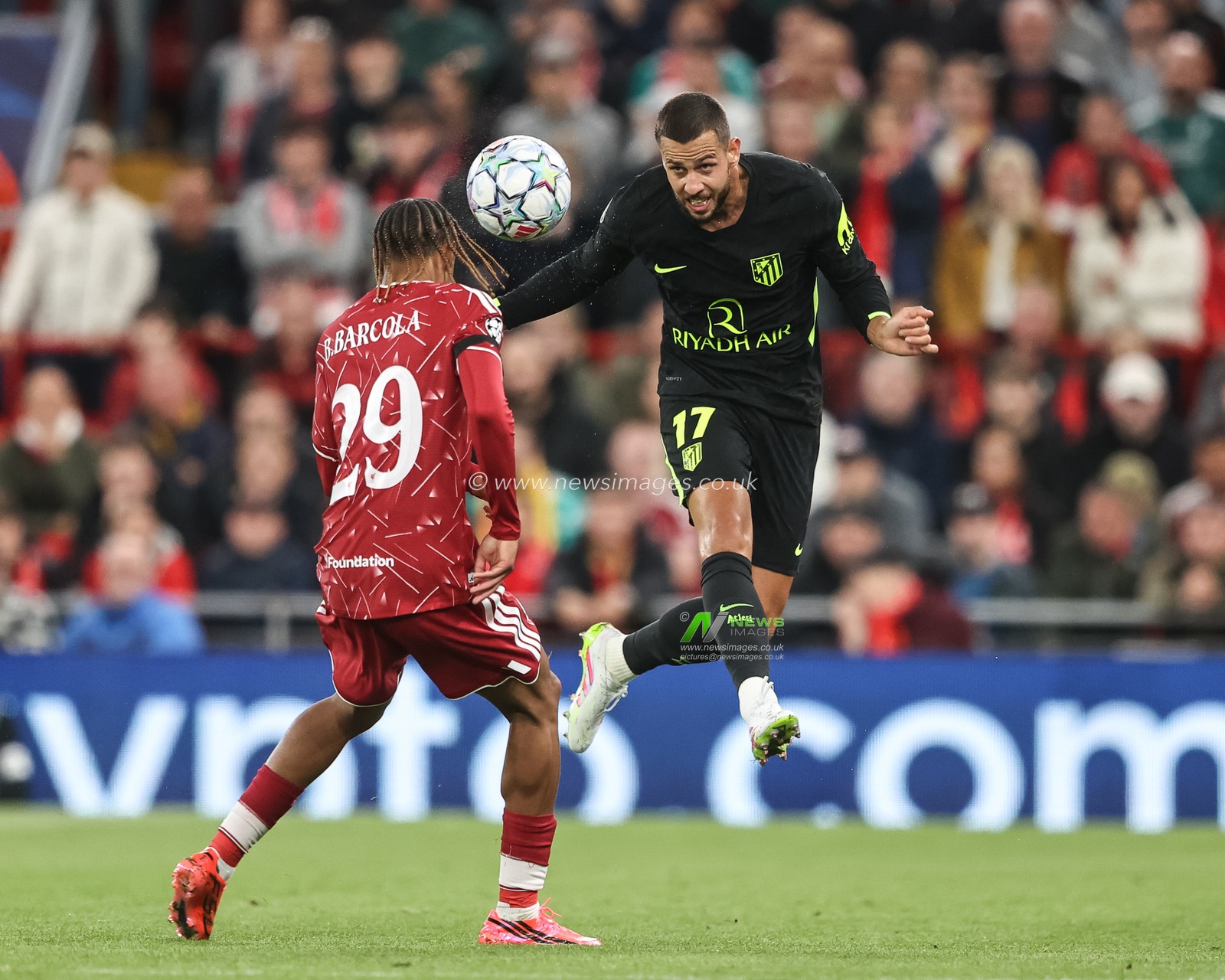 David Hancko of Atlético Madrid jumps up to win the high ball from Bradley Barcola of Liverpool during the UEFA Champions League Matchday 1 of 8 match Liverpool vs Atletico Madrid at Anfield, Liverpool, United Kingdom on 09 September 2026

(Photo by Alfie Cosgrove/News Images)