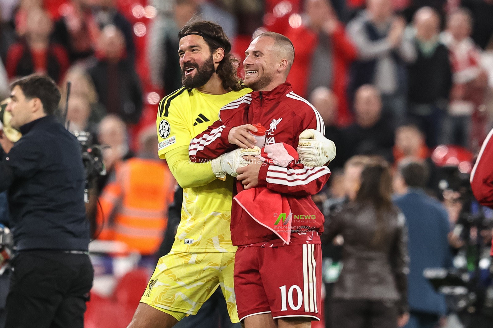 Liverpool goalkeeper Alisson Becker celebrates the win with goalscorer Alexis Mac Allister of Liverpool during the UEFA Champions League Matchday 1 of 8 match Liverpool vs Atletico Madrid at Anfield, Liverpool, United Kingdom on 09 September 2026

(Photo by Alfie Cosgrove/News Images)