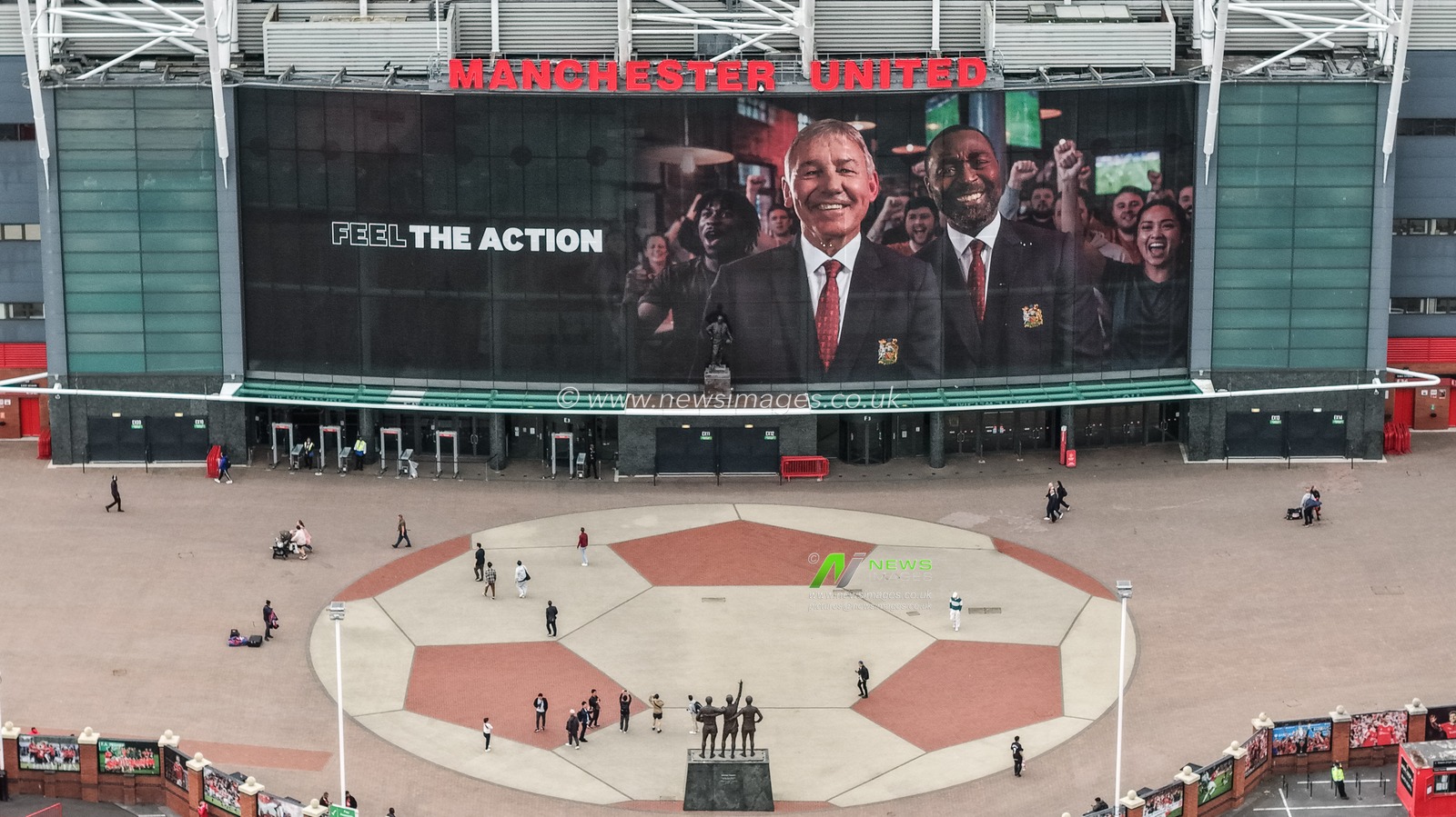 Former Manchester United players Bryan Robson and Andy Cole on the mural above the club store during the UEFA Champions League Matchday 1 of 8 match Manchester United vs Sabah FK at Old Trafford, Manchester, United Kingdom on 10 September 2026

(Photo by Mark Cosgrove/News Images)