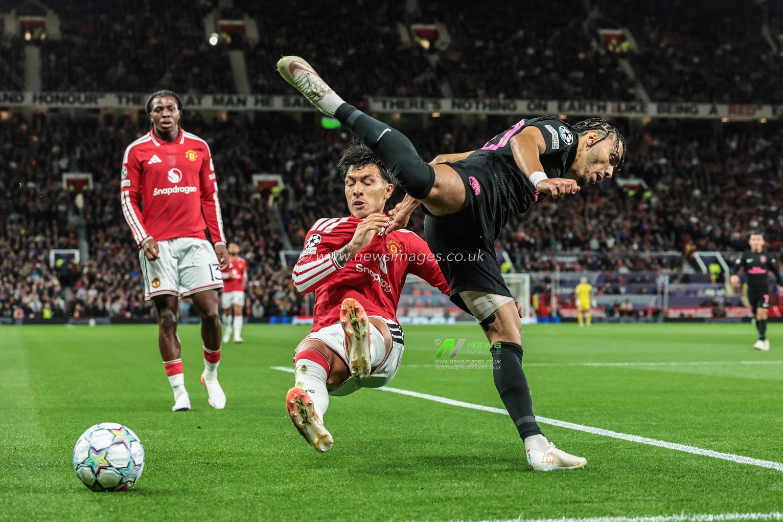 Lisandro Martinez of Manchester United and Akim Zedadka of Sabah FK battle for the ball during the UEFA Champions League Matchday 1 of 8 match Manchester United vs Sabah FK at Old Trafford, Manchester, United Kingdom on 10 September 2026

(Photo by Mark Cosgrove/News Images)
