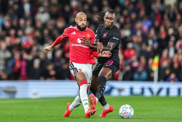 Noussair Mazraoui of Manchester United passes the ball under pressure from Orphé Mbina of Sabah FK during the UEFA Champions League Matchday 1 of 8 match Manchester United vs Sabah FK at Old Trafford, Manchester, United Kingdom on 10 September 2026

(Photo by Mark Cosgrove/News Images)