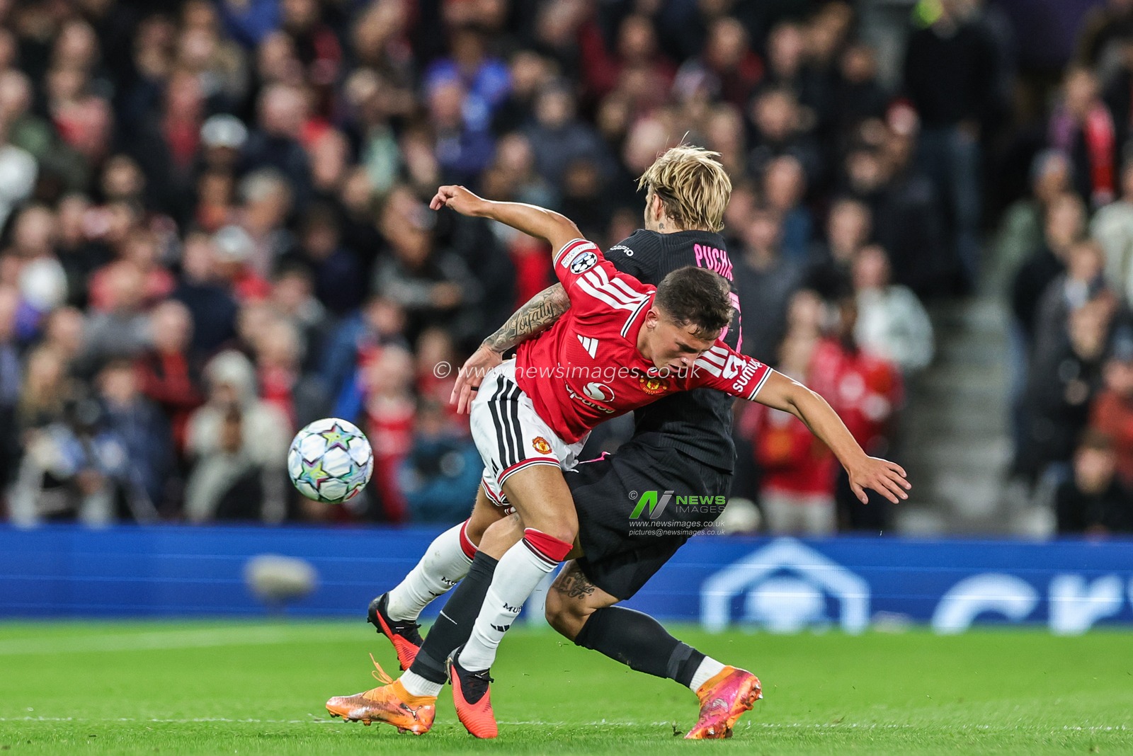 Shea Lacey of Manchester United and Tymoteusz Puchacz of Sabah FK battle for the ball during the UEFA Champions League Matchday 1 of 8 match Manchester United vs Sabah FK at Old Trafford, Manchester, United Kingdom on 10 September 2026

(Photo by Mark Cosgrove/News Images)