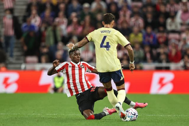 Ben White of Arsenal is tackled by Nilson Angulo of Sunderland during the Premier League match Sunderland vs Arsenal at Stadium Of Light, Sunderland, United Kingdom on 12 September 2026

(Photo by Alfie Cosgrove/News Images)