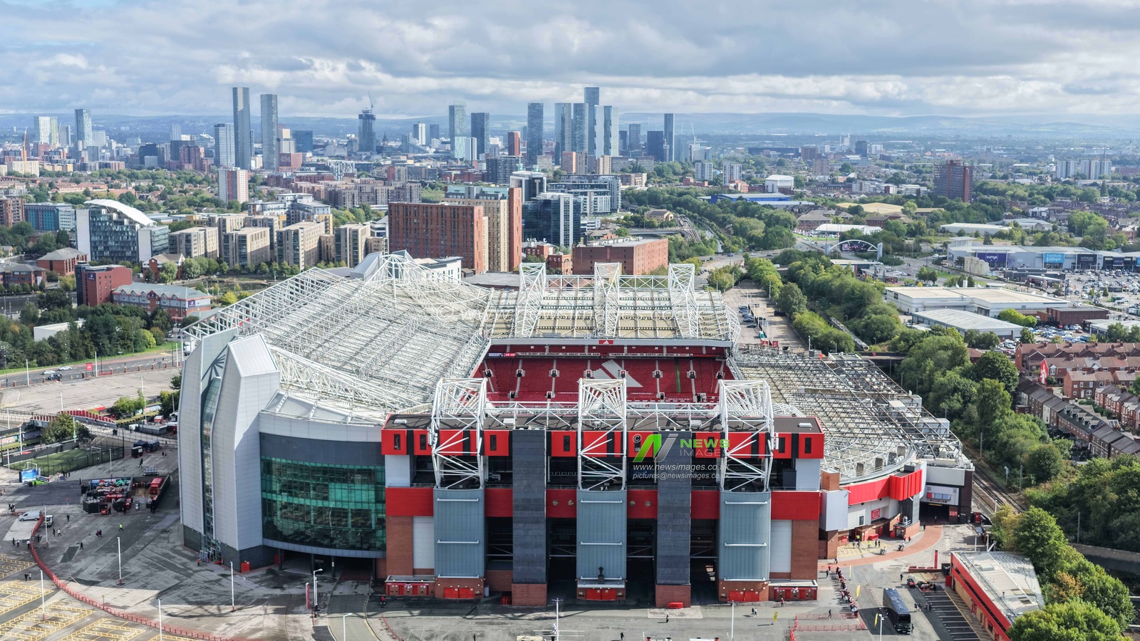 An aerial view of Old Trafford and the City of Manchester in the background during the Premier League match Manchester United vs Manchester City at Old Trafford, Manchester, United Kingdom on 13 September 2026

(Photo by Mark Cosgrove/News Images)