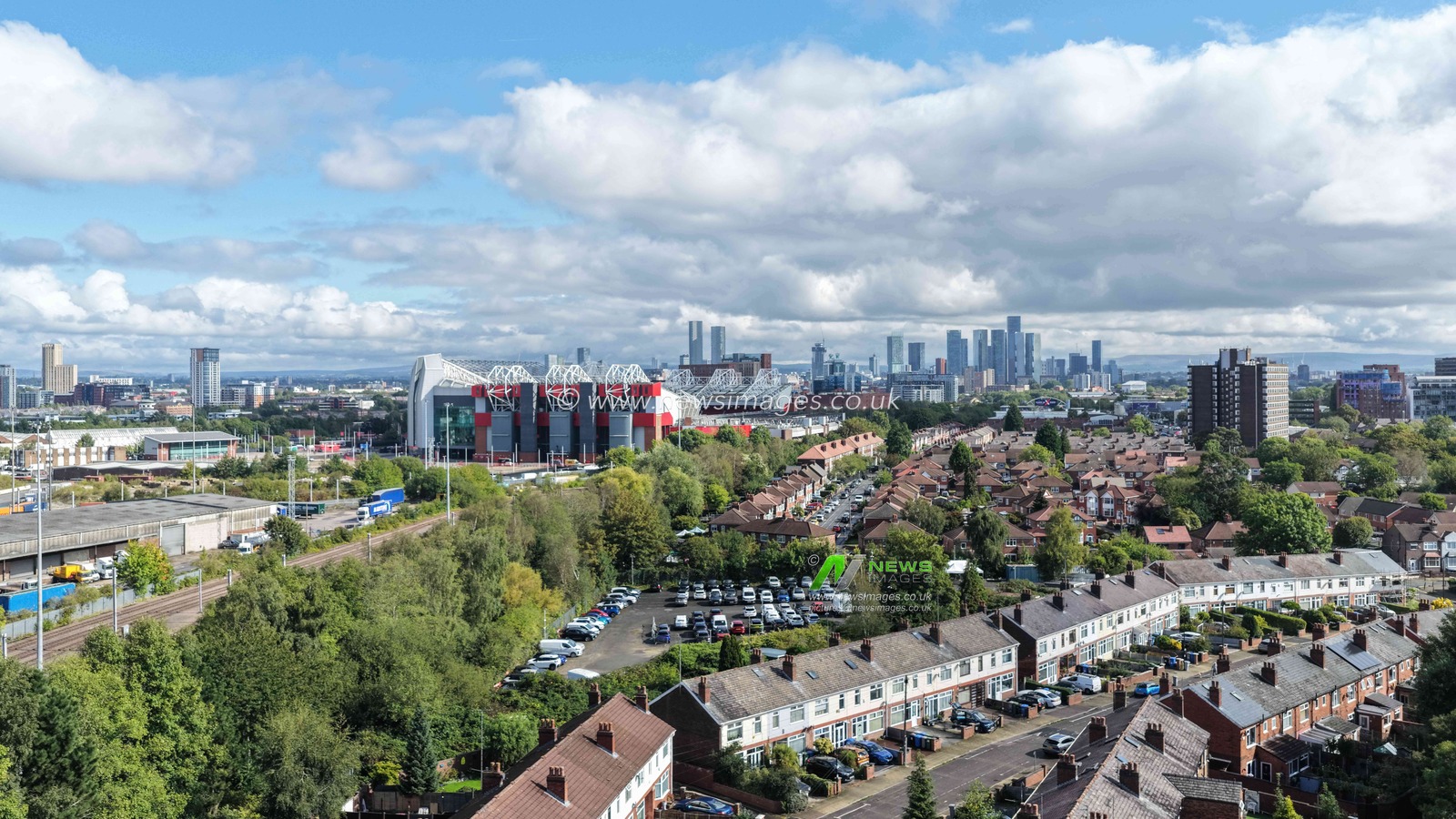 An aerial view of Old Trafford and the City of Manchester in the background during the Premier League match Manchester United vs Manchester City at Old Trafford, Manchester, United Kingdom on 13 September 2026

(Photo by Mark Cosgrove/News Images)