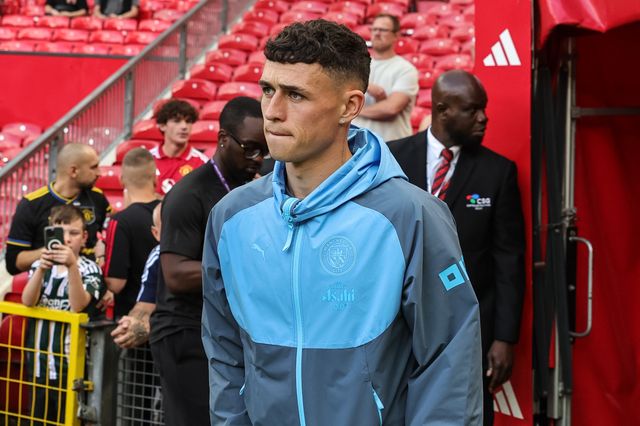 Phil Foden of Manchester City arrives during the Premier League match Manchester United vs Manchester City at Old Trafford, Manchester, United Kingdom on 13 September 2026

(Photo by Mark Cosgrove/News Images)