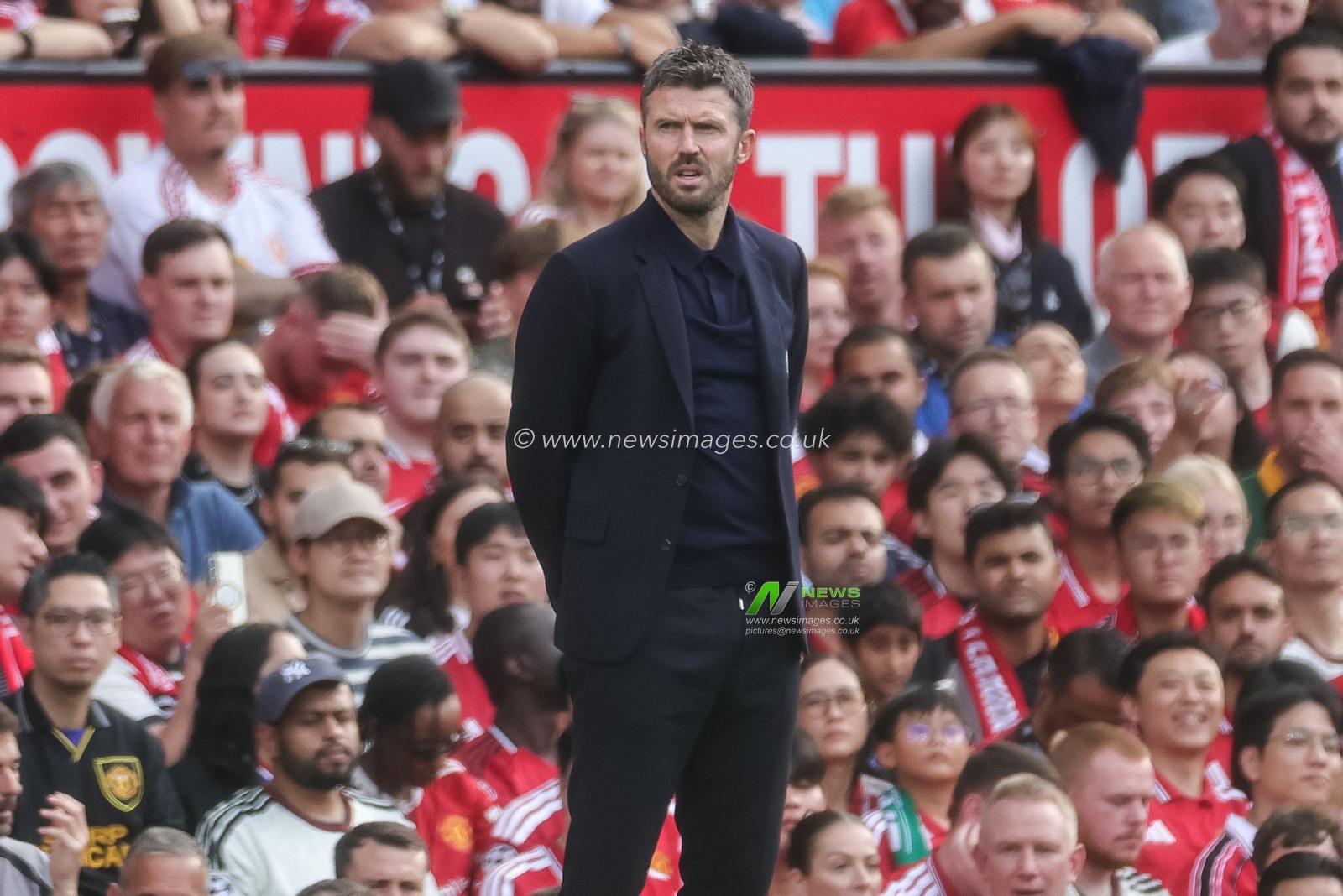 Michael Carrick manager of Manchester United looks on during the Premier League match Manchester United vs Manchester City at Old Trafford, Manchester, United Kingdom on 13 September 2026

(Photo by Mark Cosgrove/News Images)