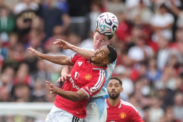 Elliot Anderson of Manchester City jumps up to win the high ball from Youri Tielemans of Manchester United during the Premier League match Manchester United vs Manchester City at Old Trafford, Manchester, United Kingdom on 13 September 2026

(Photo by Mark Cosgrove/News Images)