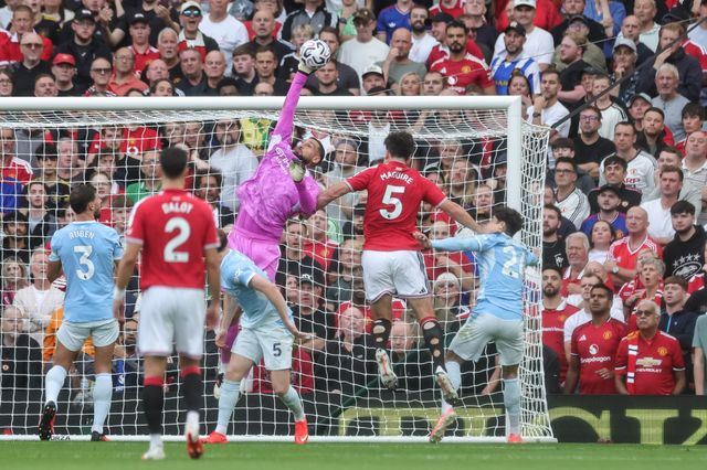 Manchester City goalkeeper Gianluigi Donnarumma makes a save during the Premier League match Manchester United vs Manchester City at Old Trafford, Manchester, United Kingdom on 13 September 2026

(Photo by Mark Cosgrove/News Images)