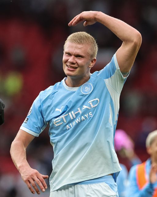 Goalscorer Erling Haaland of Manchester City celebrates the 0-1 win with the City cans during the Premier League match Manchester United vs Manchester City at Old Trafford, Manchester, United Kingdom on 13 September 2026

(Photo by Mark Cosgrove/News Images)