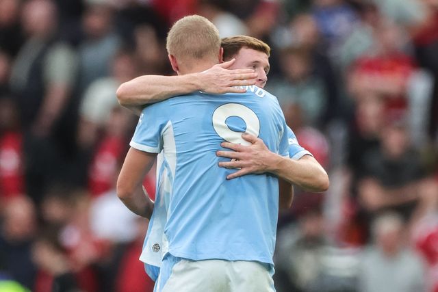 Elliot Anderson of Manchester City embraces Erling Haaland of Manchester City after the final whistle during the Premier League match Manchester United vs Manchester City at Old Trafford, Manchester, United Kingdom on 13 September 2026

(Photo by Mark Cosgrove/News Images)