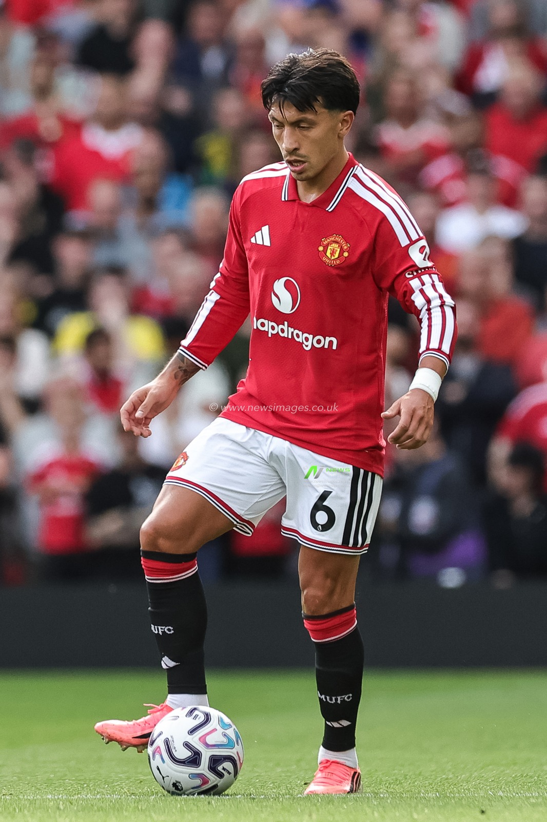 Lisandro Martinez of Manchester United with the ball during the Premier League match Manchester United vs Manchester City at Old Trafford, Manchester, United Kingdom on 13 September 2026

(Photo by Mark Cosgrove/News Images)