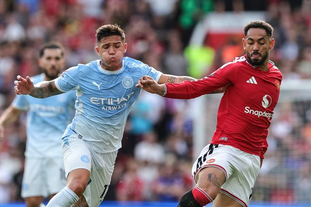 Enzo Fernandez of Manchester City and Matheus Cunha of Manchester United battle for the ball during the Premier League match Manchester United vs Manchester City at Old Trafford, Manchester, United Kingdom on 13 September 2026

(Photo by Mark Cosgrove/News Images)