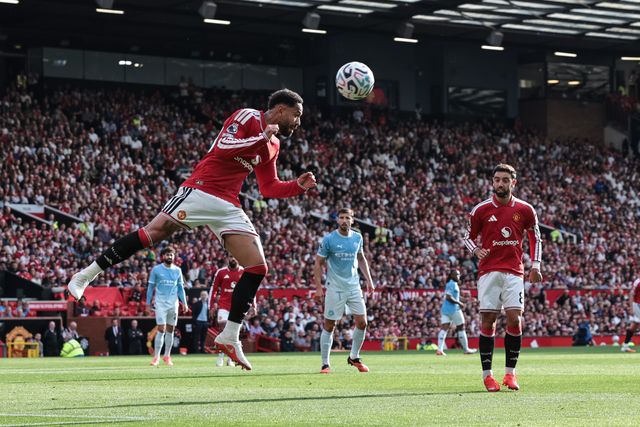 Matheus Cunha of Manchester United heads the ball clear of his defensive area during the Premier League match Manchester United vs Manchester City at Old Trafford, Manchester, United Kingdom on 13 September 2026

(Photo by Mark Cosgrove/News Images)