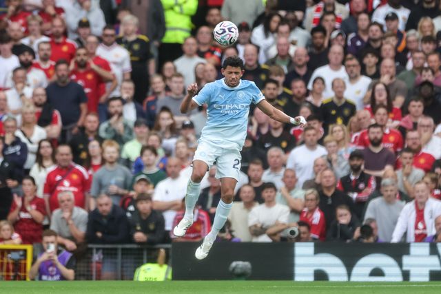 Matheus Nunes of Manchester City jumps up to win the high ball during the Premier League match Manchester United vs Manchester City at Old Trafford, Manchester, United Kingdom on 13 September 2026

(Photo by Mark Cosgrove/News Images)
