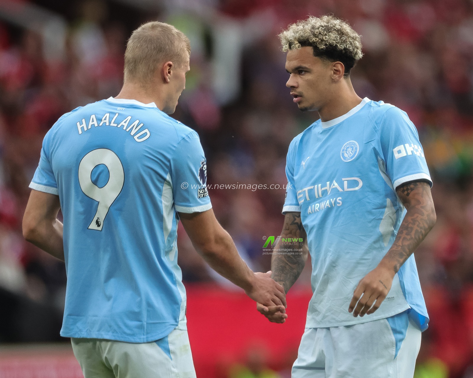 Erling Haaland of Manchester City shales hands with Nico O'Reilly of Manchester City during the Premier League match Manchester United vs Manchester City at Old Trafford, Manchester, United Kingdom on 13 September 2026

(Photo by Mark Cosgrove/News Images)