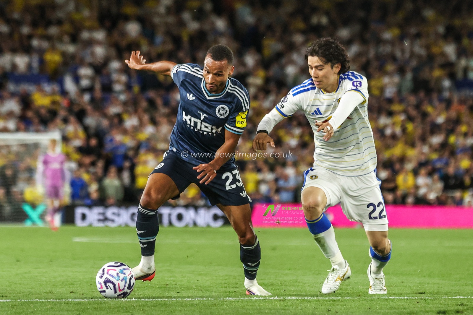 Jacob Murphy of Newcastle United and Ao Tanaka of Leeds United battle for the ball during the Premier League match Leeds United vs Newcastle Untied at Elland Road, Leeds, United Kingdom on 14 September 2026

(Photo by Alfie Cosgrove/News Images)