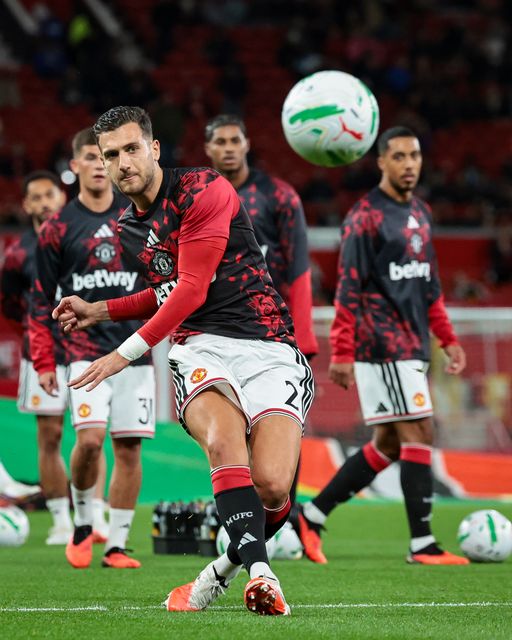 Diogo Dalot of Manchester United in the pregame warmup session  during the Carabao Cup round 3 match Manchester United vs Brighton & Hove Albion at Old Trafford, Manchester, United Kingdom on 16 September 2026

(Photo by Mark Cosgrove/News Images)