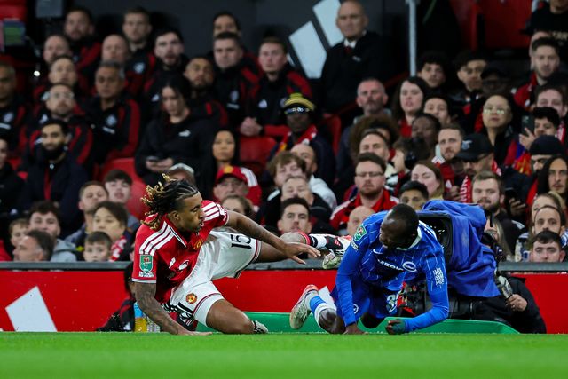 Leny Yoro of Manchester United fouls Malick Yalcouye of Brighton & Hove Albion during the Carabao Cup round 3 match Manchester United vs Brighton & Hove Albion at Old Trafford, Manchester, United Kingdom on 16 September 2026

(Photo by Mark Cosgrove/News Images)