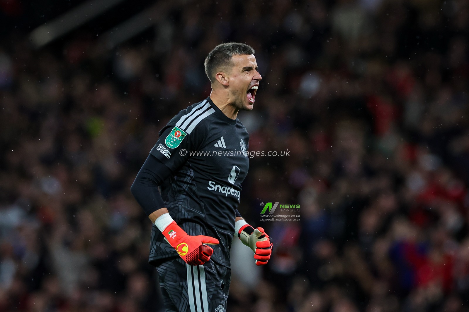 Manchester United goalkeeper Karl Darlow celebrates Shea Lacey of Manchester United scoring a goal to make it 1-0   during the Carabao Cup round 3 match Manchester United vs Brighton & Hove Albion at Old Trafford, Manchester, United Kingdom on 16 September 2026

(Photo by Mark Cosgrove/News Images)