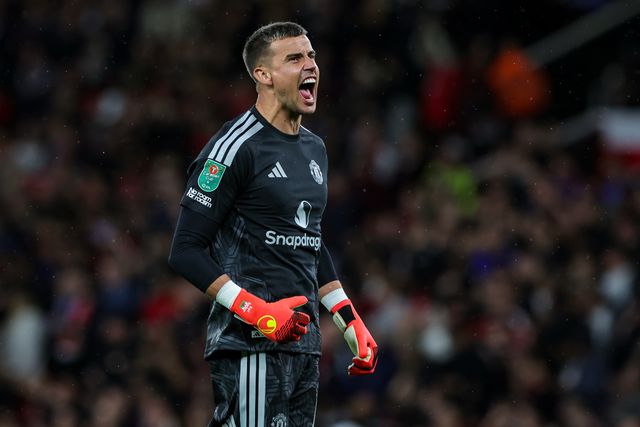 Manchester United goalkeeper Karl Darlow celebrates Shea Lacey of Manchester United scoring a goal to make it 1-0   during the Carabao Cup round 3 match Manchester United vs Brighton & Hove Albion at Old Trafford, Manchester, United Kingdom on 16 September 2026

(Photo by Mark Cosgrove/News Images)