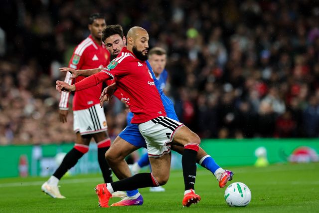 Matt O'Riley of Brighton & Hove Albion battles for the ball with Noussair Mazraoui of Manchester United during the Carabao Cup round 3 match Manchester United vs Brighton & Hove Albion at Old Trafford, Manchester, United Kingdom on 16 September 2026

(Photo by Mark Cosgrove/News Images)