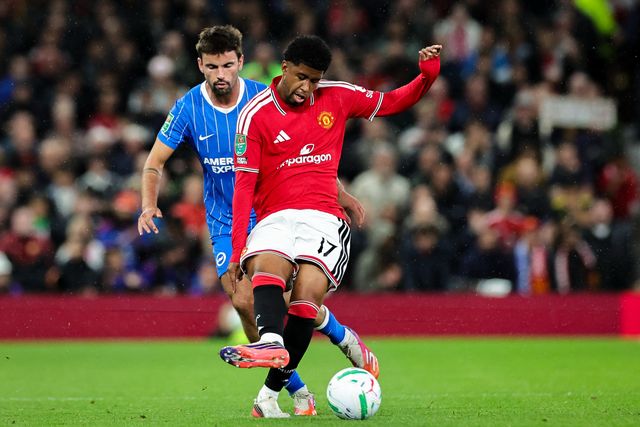 Andrey Santos of Manchester United passes the ball  under pressure from Matt O'Riley of Brighton & Hove Albion during the Carabao Cup round 3 match Manchester United vs Brighton & Hove Albion at Old Trafford, Manchester, United Kingdom on 16 September 2026

(Photo by Mark Cosgrove/News Images)