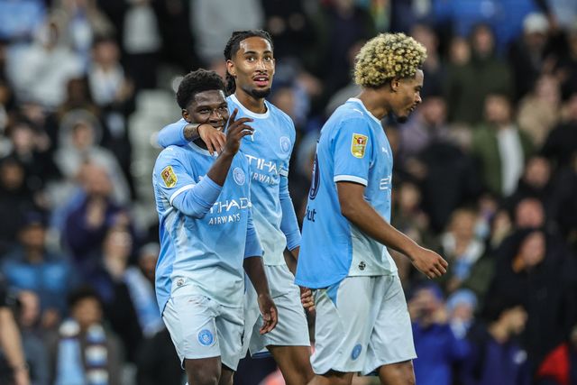 Ryan McAidoo of Manchester City celebrates his goal to make it 5-0 during the Carabao Cup round 3 match Manchester City vs Norwich City at Etihad Stadium, Manchester, United Kingdom on 17 September 2026

(Photo by Mark Cosgrove/News Images)