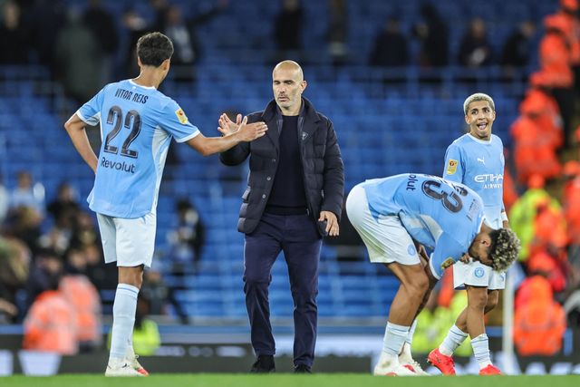 Vitor Reis of Manchester City shakes hands with Enzo Maresca manager of Manchester City after the game during the Carabao Cup round 3 match Manchester City vs Norwich City at Etihad Stadium, Manchester, United Kingdom on 17 September 2026

(Photo by Mark Cosgrove/News Images)