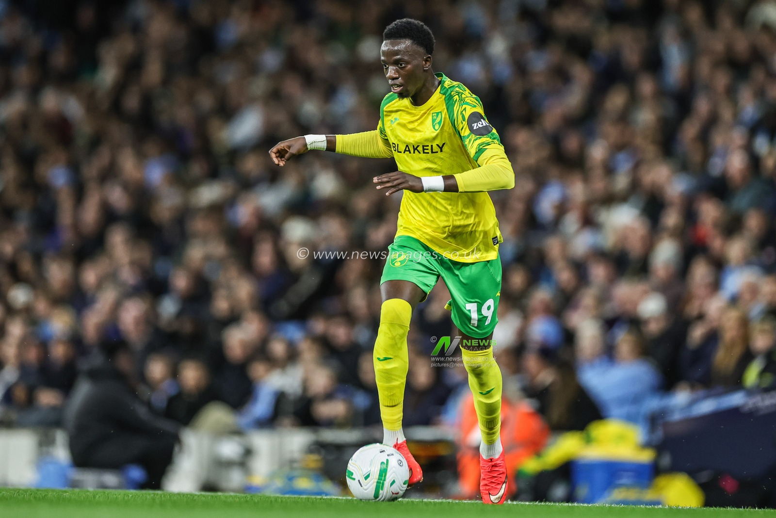 Papa Amadou Diallo of Norwich City breaks with the ball during the Carabao Cup round 3 match Manchester City vs Norwich City at Etihad Stadium, Manchester, United Kingdom on 17 September 2026

(Photo by Mark Cosgrove/News Images)