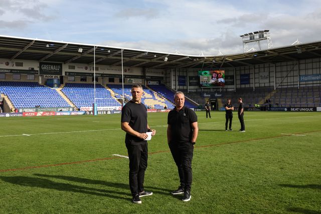 Sam Burgess manager of Warrington Wolves speaks with Steve McNamara during the Betfred Super League Play-off Eliminator round match Warrington Wolves vs Hull KR at The Halliwell Jones Stadium, Warrington, United Kingdom on 19 September 2026

(Photo by Mark Cosgrove/News Images)