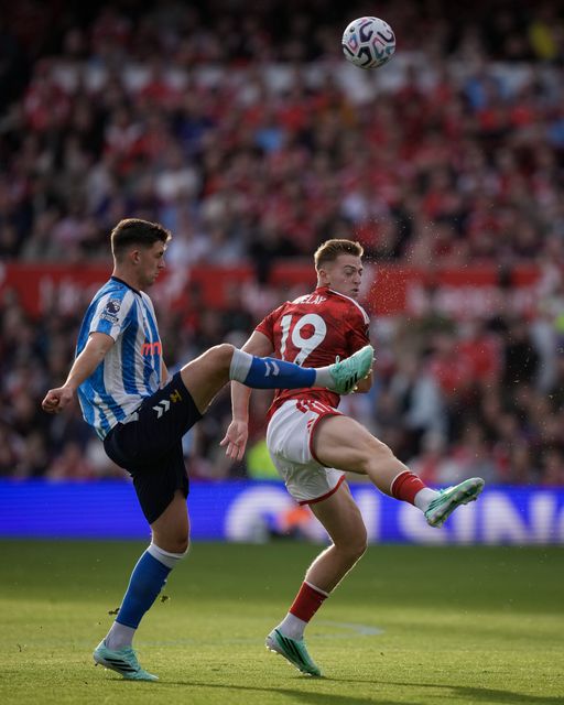 Liam Delap of Nottingham Forest battles for a high ball with Bobby Thomas of Coventry City during the Premier League match Nottingham Forest vs Coventry City at City Ground, Nottingham, United Kingdom on 19 September 2026

(Photo by Maynard Manyowa/News Images)