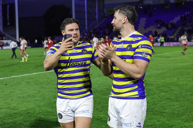 Joe Philbin of Warrington Wolves and Toby King of Warrington Wolves celebrate the win during the Betfred Super League Play-off Eliminator round match Warrington Wolves vs Hull KR at The Halliwell Jones Stadium, Warrington, United Kingdom on 19 September 2026

(Photo by Mark Cosgrove/News Images)