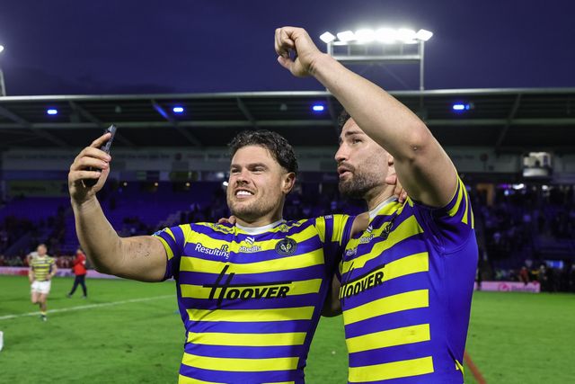 Joe Philbin of Warrington Wolves and Toby King of Warrington Wolves celebrate the win during the Betfred Super League Play-off Eliminator round match Warrington Wolves vs Hull KR at The Halliwell Jones Stadium, Warrington, United Kingdom on 19 September 2026

(Photo by Mark Cosgrove/News Images)