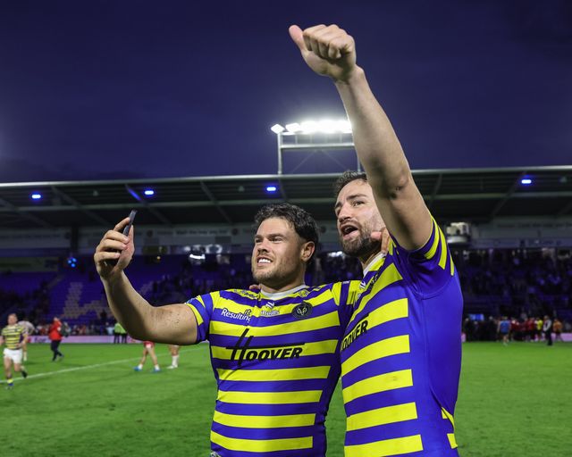 Joe Philbin of Warrington Wolves and Toby King of Warrington Wolves celebrate the win during the Betfred Super League Play-off Eliminator round match Warrington Wolves vs Hull KR at The Halliwell Jones Stadium, Warrington, United Kingdom on 19 September 2026

(Photo by Mark Cosgrove/News Images)