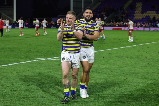 Luke Yates of Warrington Wolves and Kelepi Tanginoa of Warrington Wolves celebrate the win during the Betfred Super League Play-off Eliminator round match Warrington Wolves vs Hull KR at The Halliwell Jones Stadium, Warrington, United Kingdom on 19 September 2026

(Photo by Mark Cosgrove/News Images)
