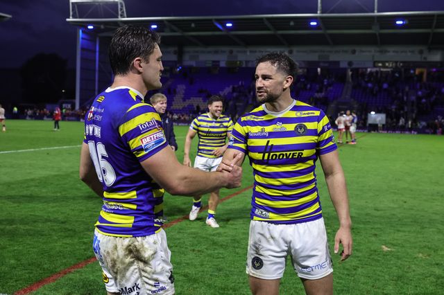 Liam Byrne of Warrington Wolves shakes hands with Toby King of Warrington Wolves during the Betfred Super League Play-off Eliminator round match Warrington Wolves vs Hull KR at The Halliwell Jones Stadium, Warrington, United Kingdom on 19 September 2026

(Photo by Mark Cosgrove/News Images)