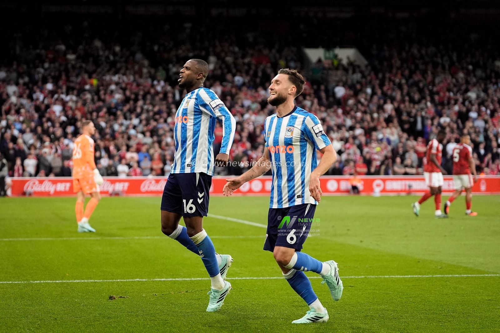 Frank Onyeka of Coventry City and Matt Grimes of Coventry City celebrates Jay Dasilva of Coventry City scoring goal to make it  during the Premier League match Nottingham Forest vs Coventry City at City Ground, Nottingham, United Kingdom on 19 September 2026

(Photo by Maynard Manyowa/News Images)