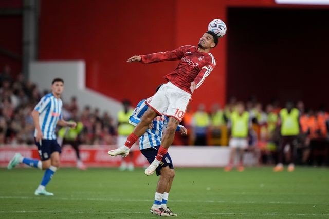 Morgan Gibbs-White of Nottingham Forest jumps up to win the high ball  from Jay Dasilva of Coventry City during the Premier League match Nottingham Forest vs Coventry City at City Ground, Nottingham, United Kingdom on 19 September 2026

(Photo by Maynard Manyowa/News Images)