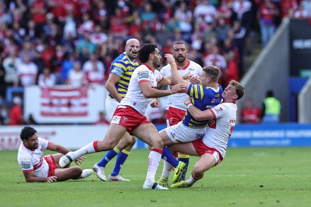George Williams of Warrington Wolves is tackled by Jack Broadbent of Hull KR during the Betfred Super League Play-off Eliminator round match Warrington Wolves vs Hull KR at The Halliwell Jones Stadium, Warrington, United Kingdom on 19 September 2026

(Photo by Mark Cosgrove/News Images)