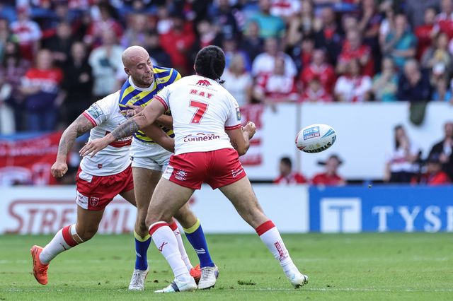 James Harrison of Warrington Wolves offloads during the Betfred Super League Play-off Eliminator round match Warrington Wolves vs Hull KR at The Halliwell Jones Stadium, Warrington, United Kingdom on 19 September 2026

(Photo by Mark Cosgrove/News Images)