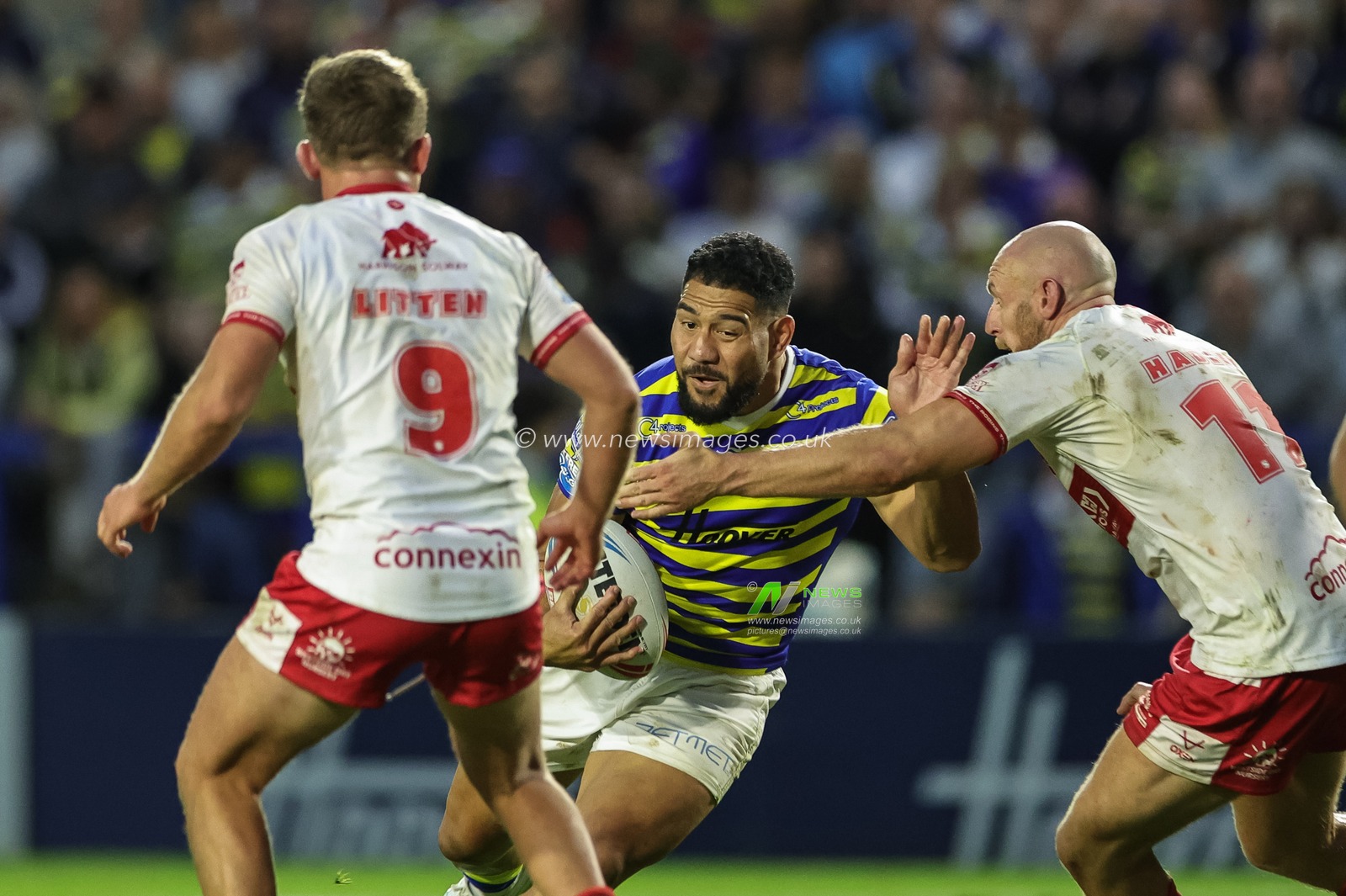 Kelepi Tanginoa of Warrington Wolves is tackled by Dean Hadley of Hull KR during the Betfred Super League Play-off Eliminator round match Warrington Wolves vs Hull KR at The Halliwell Jones Stadium, Warrington, United Kingdom on 19 September 2026

(Photo by Mark Cosgrove/News Images)
