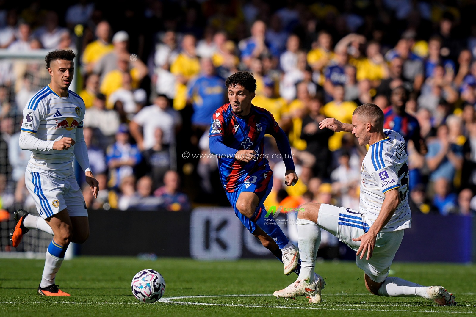 Yeremi Pino of Crystal Palace dribbles past Gabriel Gudmundsson of Leeds United and Ethan Ampadu of Leeds United during the Premier League match Leeds United vs Crystal Palace at Elland Road, Leeds, United Kingdom on 20 September 2026

(Photo by Maynard Manyowa/News Images)