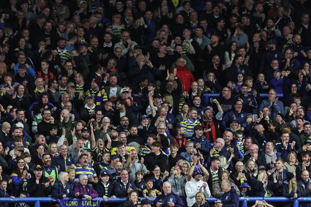 Warrington fans celebrate the try of James Bentley of Warrington Wolves (not pictured) during the Betfred Super League Play-off Semi-Final match Leeds Rhinos vs Warrington Wolves at AMT Headingley Stadium, Leeds, United Kingdom on 25 September 2026

(Photo by Mark Cosgrove/News Images)