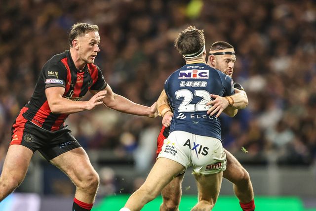 Riley Lumb of Leeds Rhinos is tackled by Danny Walker of Warrington Wolves during the Betfred Super League Play-off Semi-Final match Leeds Rhinos vs Warrington Wolves at AMT Headingley Stadium, Leeds, United Kingdom on 25 September 2026

(Photo by Alfie Cosgrove/News Images)