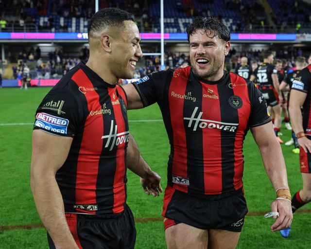Albert Hopoate of Warrington Wolves and Joe Philbin of Warrington Wolves celebrate the win during the Betfred Super League Play-off Semi-Final match Leeds Rhinos vs Warrington Wolves at AMT Headingley Stadium, Leeds, United Kingdom on 25 September 2026

(Photo by Mark Cosgrove/News Images)
