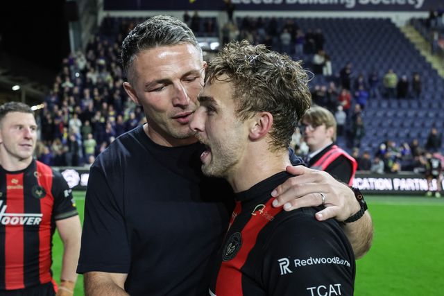 Sam Burgess manager of Warrington Wolves and Sam Powell of Warrington Wolves celebrate the win during the Betfred Super League Play-off Semi-Final match Leeds Rhinos vs Warrington Wolves at AMT Headingley Stadium, Leeds, United Kingdom on 25 September 2026

(Photo by Mark Cosgrove/News Images)