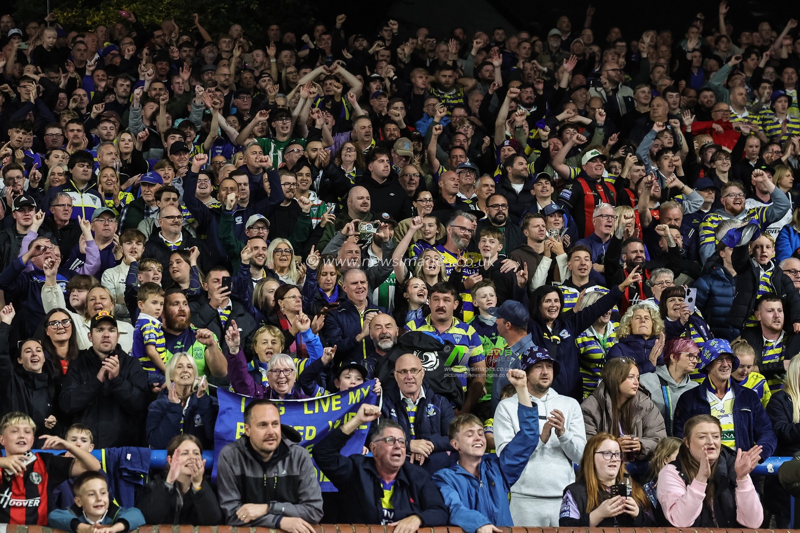 Warrington fans celebrate the win as they book their place in the final at Old Trafford during the Betfred Super League Play-off Semi-Final match Leeds Rhinos vs Warrington Wolves at AMT Headingley Stadium, Leeds, United Kingdom on 25 September 2026

(Photo by Mark Cosgrove/News Images)